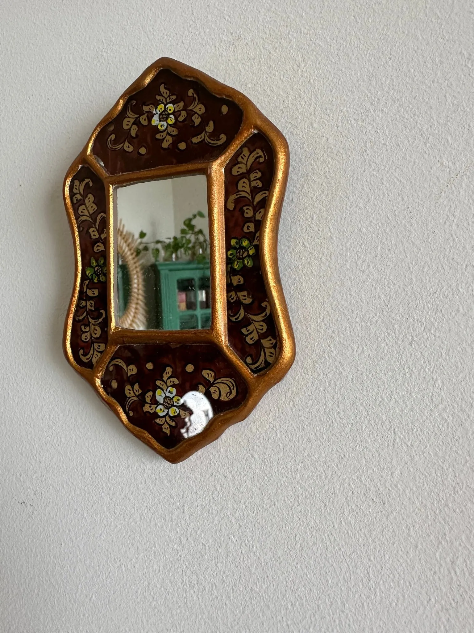 Miroir péruvien émaillé or et marron glacé